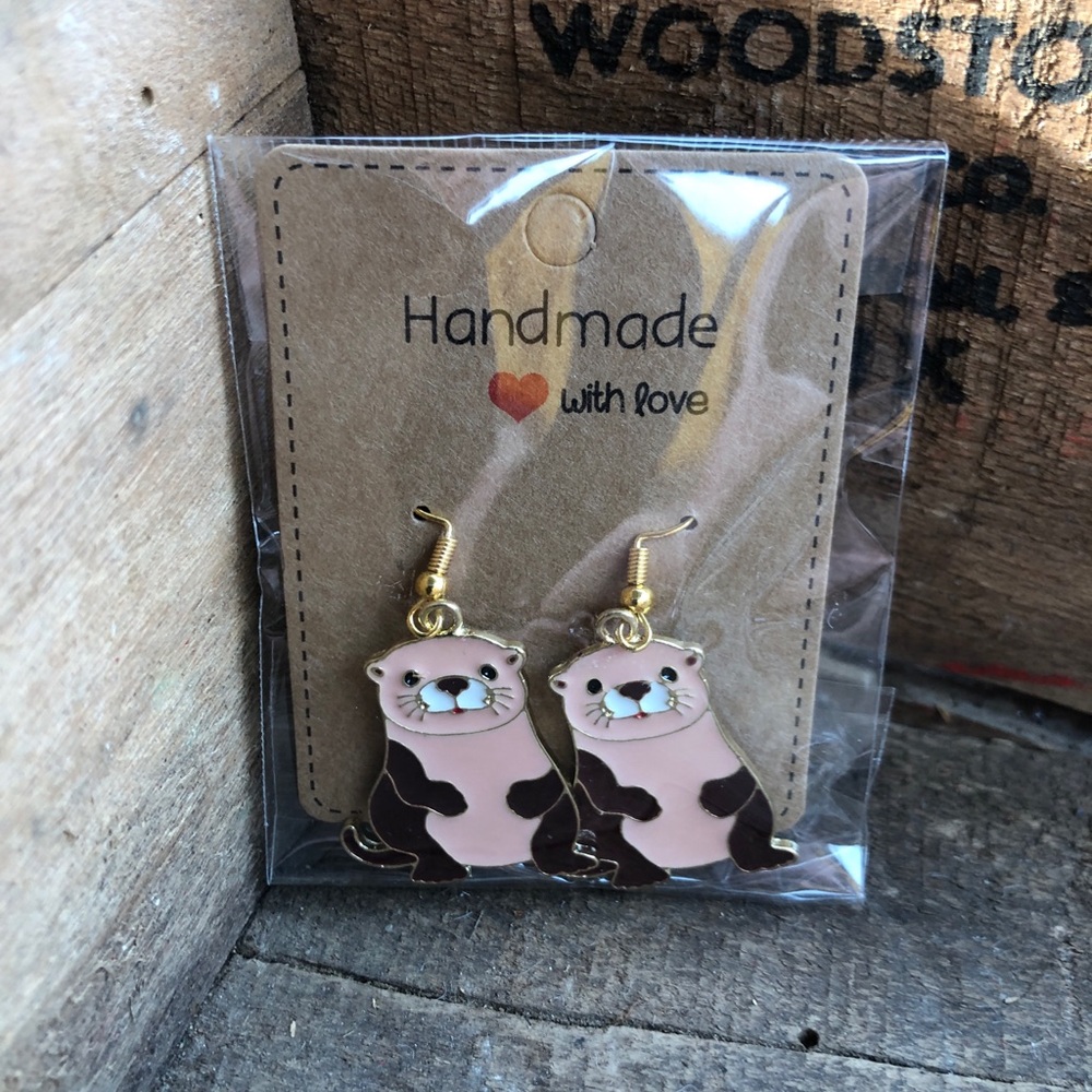 New otter earrings